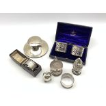 Silver capstan inkwell Birmingham 1918, cased pair of pierced silver serviette rings, two others,