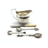 George III silver cream jug with engraved decoration and angular handle,