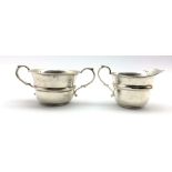 Silver two handled circular sugar bowl and matching cream jug Birmingham 1930 5.