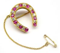 Early 20th century gold ruby and old cut diamond horseshoe brooch Condition Report &