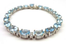 18ct white gold aquamarine and diamond bracelet, stamped 750, aquamarine total weight 12.