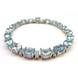 18ct white gold aquamarine and diamond bracelet, stamped 750, aquamarine total weight 12.