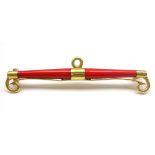 Early 20th century gold and red enamel bar brooch,