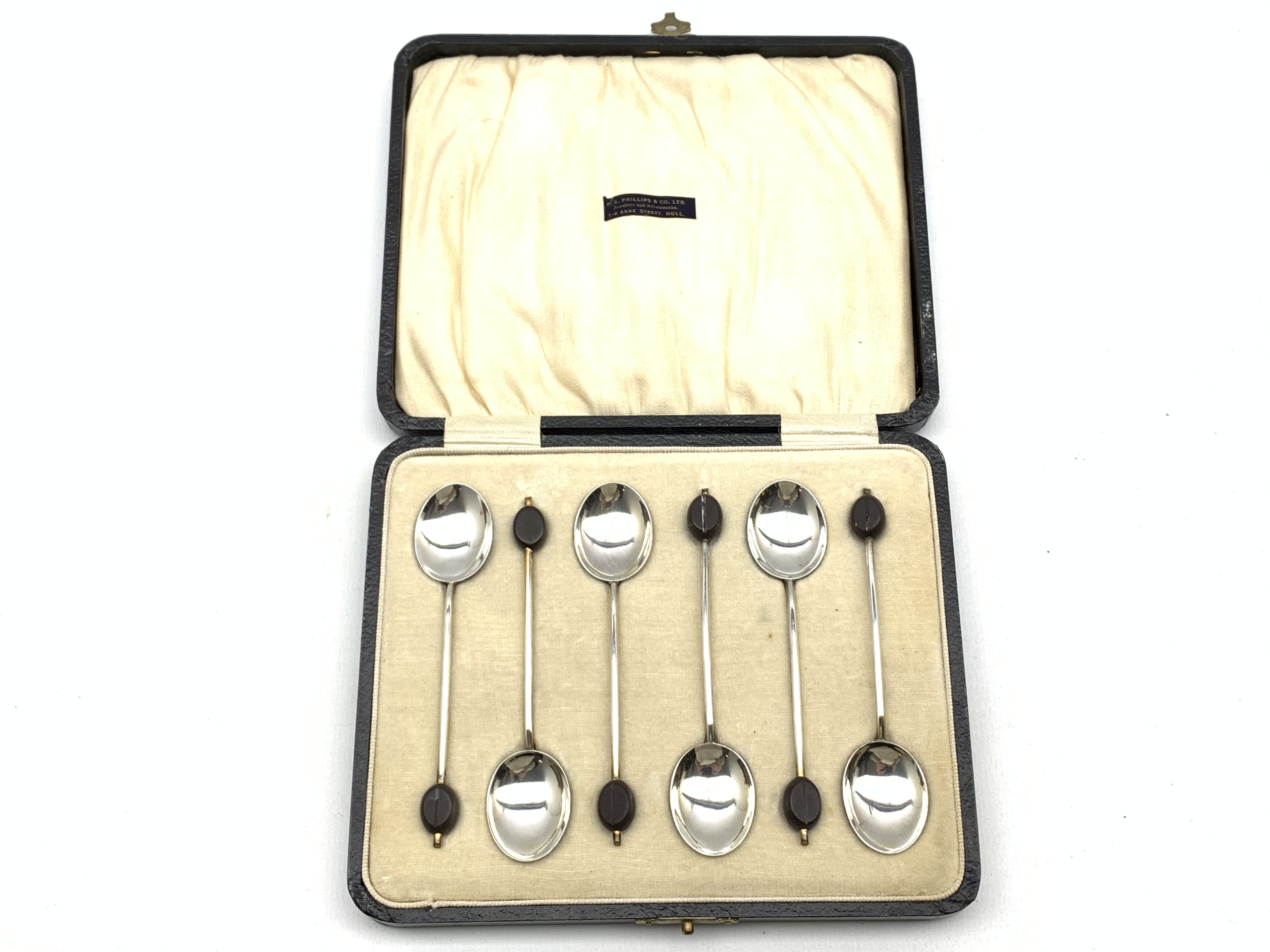 Set of six silver and enamel coffee spoons with variously coloured bowls Birmingham 1929 Maker