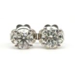 Pair of 18ct white gold, round brilliant cut diamond stud earrings, stamped 750,