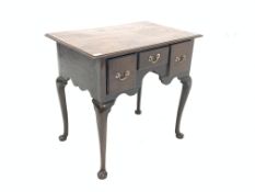 George III oak lowboy, top with moulded edge above one short and two deep drawers, shaped apron,