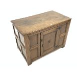 Oak Low cupboard, single fielded panelled door with carved lozenge decoration, stile supports,