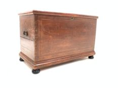 Victorian stained pine blanket box, with hinged lid, raised on compressed bun feet,