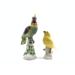 Meissen figure of a canary perched on a tree stump H10cm with impressed numerals 227 and a