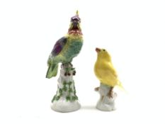 Meissen figure of a canary perched on a tree stump H10cm with impressed numerals 227 and a