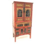 Late 19th century Chinese red and black lacquered cabinet,
