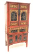 Late 19th century Chinese red and black lacquered cabinet,