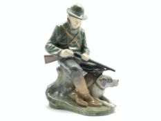 Royal Copenhagen figure of a Huntsman and his dog modelled by Christian Thomsen No.