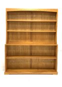 Richard 'Doug' Collinson Yorkshire oak open bookcase, with lunette carved frieze,