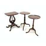 Regency design walnut occasional table, octagonal top raised on lyre shaped and carved pedestal,