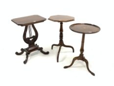Regency design walnut occasional table, octagonal top raised on lyre shaped and carved pedestal,