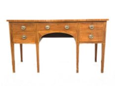 Georgian mahogany kneehole sideboard, one long drawer flanked by one deep drawer and one cupboard,