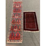Persian design baluch red ground rug, with repeating octagonal design on orange field,