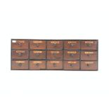 Early 20th century stained and ebonised pine tabletop chemists chest of 15 drawers,