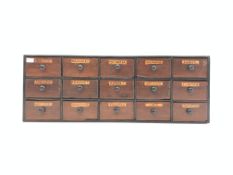 Early 20th century stained and ebonised pine tabletop chemists chest of 15 drawers,