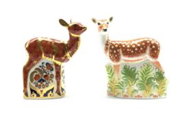 Royal Crown Derby paperweight modelled as a Fallow Deer and another as a Fawn,