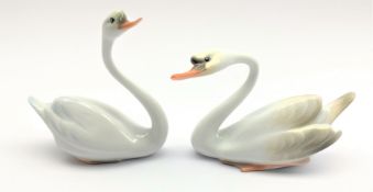 Pair of Herend male and female swans Nos.