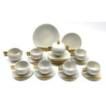 Carlton Ware Art Deco tea set of circular form decorated in grey with gilt handles and highlights