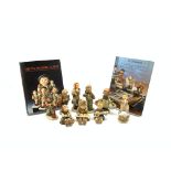 Nine Hummel Goebel figures including 'Wash Day', 'Puppy Love', 'Candelight',