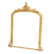 Late 19th century gilt framed upright over mantel mirror, with floral carved applied decoration,