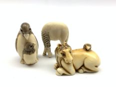 Japanese ivory netsuke in the form of a horse and rabbit, signature mark to base,