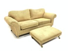 Kirkdale two seat sofa, upholstered in stripped green and yellow fabric, out scrolled arms,