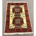 Persian Heriz red ground rug, herati motif on ivory field, stylised trailing foliate to border,