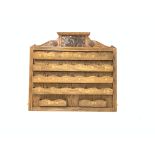 Early 20th century oak wall mounted correspondence rack carved with the Yorkshire regiment crest,