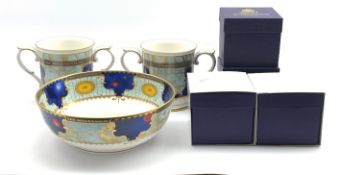 Collection of Royal Worcester Millennium pieces including pair of loving cups,
