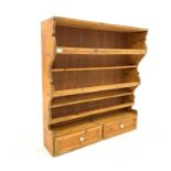 19th century pine three tier plate rack, with two panelled drawers,