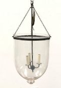 Pair of three light electroliers housed within large glass bell shaped shades,