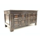 Jacobean design oak coffer, with geometric panelled front and sides, split turned pilasters,