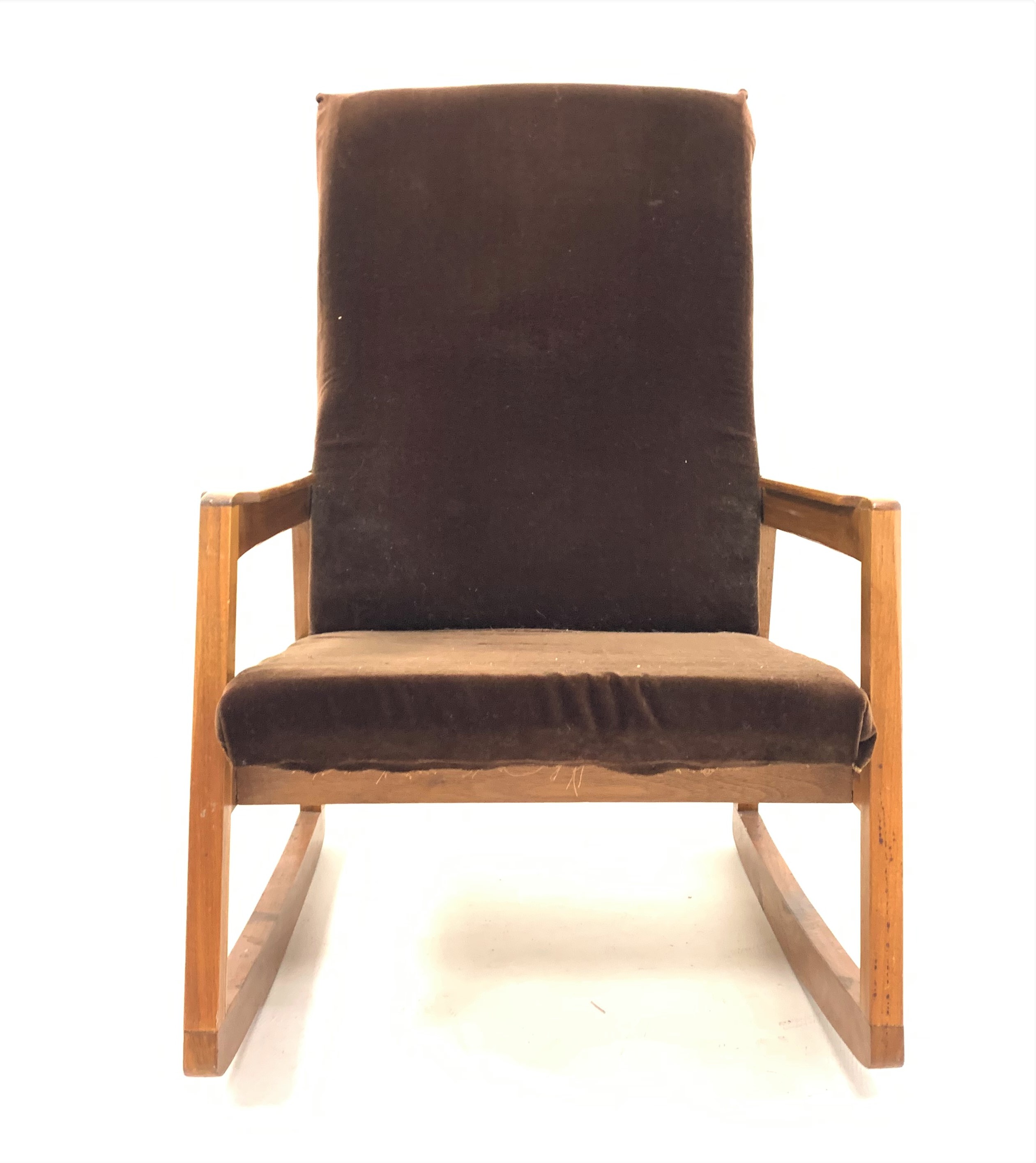 mid 20th century teak framed rocking chair with upholstered seat and back panel,