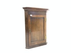 19th century and later oak wall hanging corner cupboard projecting cornice,