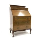 20th century Queen Anne style mahogany bureau, raised back above three sort drawers,