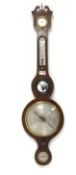 Early 20th century mahogany cased wheel barometer and thermometer with silvered registers,