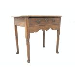 17th century oak side table, octagonal moulded top above single frieze drawer,