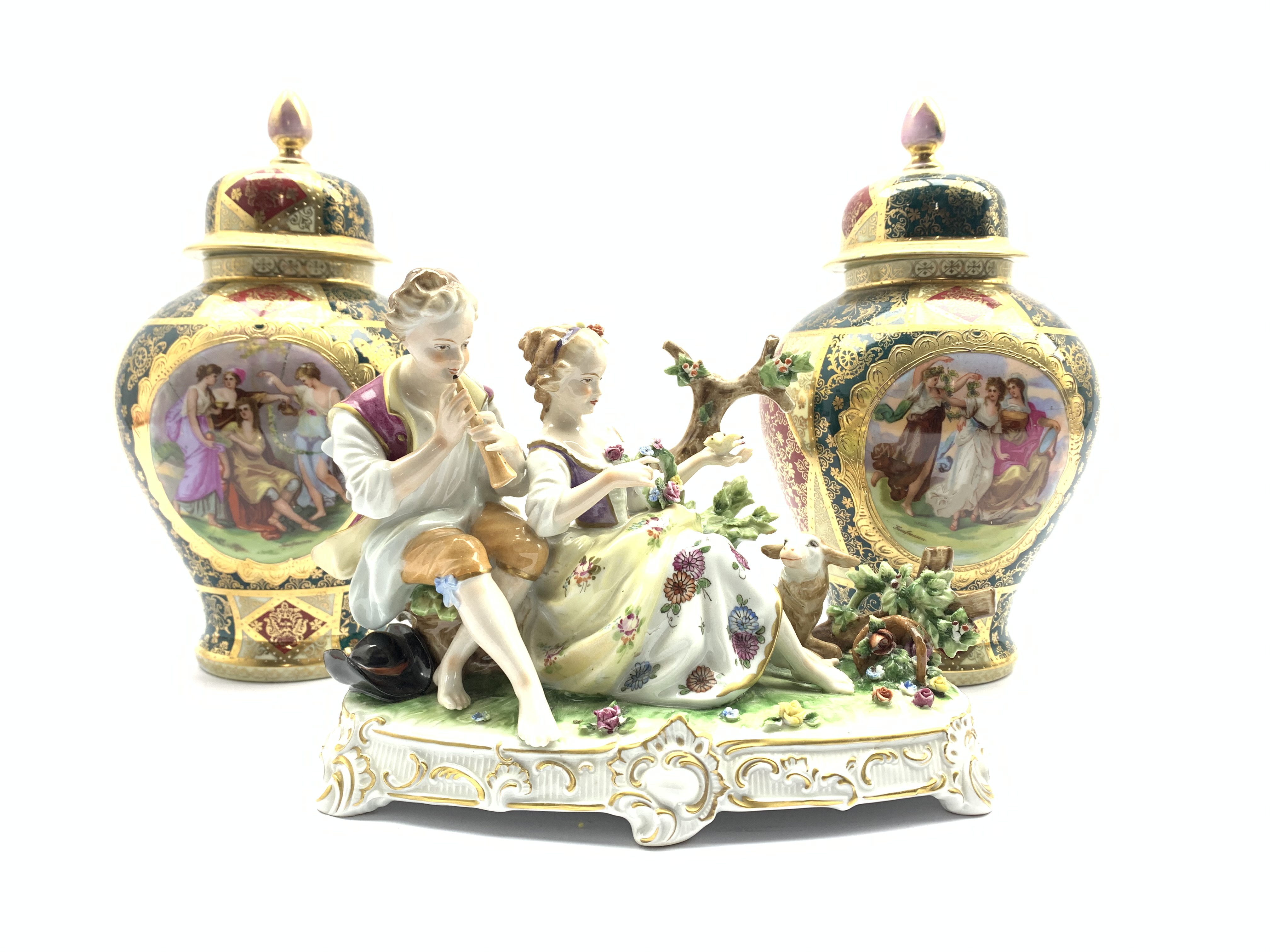 Pair of Vienna style vases and covers decorated with panels of figures after Angelica Kaufmann with