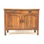 Edwardian walnut sideboard, with moulded rectangular top over two frieze drawers and two cupboards,