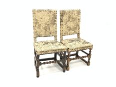 Pair Charles II style oak hall chairs, cresting rail carved with lion mask,