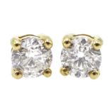 Pair of 18ct gold brilliant cut diamond stud earrings, stamped 750, total diamond weight 1.