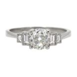 Platinum round and baguette cut diamond ring, stamped Plat, central diamond approx 0.