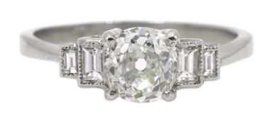 Platinum round and baguette cut diamond ring, stamped Plat, central diamond approx 0.