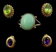 Gold cabochon jade ring, pair of gold peridot stud earrings and pair of gold amethyst stud earrings,