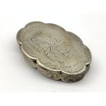 Early Victorian silver box of lobed oval design engraved with a landscape and later inscription 8cm